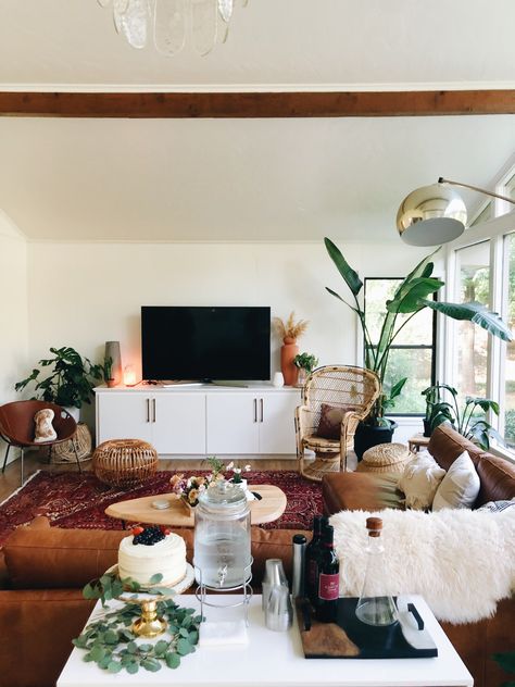 Brown leather couch with plants in boho living room @peytonrbyford Leather Couch Boho Living Room, Brown Leather Sofa Small Living Room, Lounge Room Brown Leather Couch, Honey Couch Living Room, Boho Leather Couch, Living Room Tan Leather Couch, Brown Faux Leather Couch Living Room, Styling Old Leather Couch, Brown Leather Couch Apartment