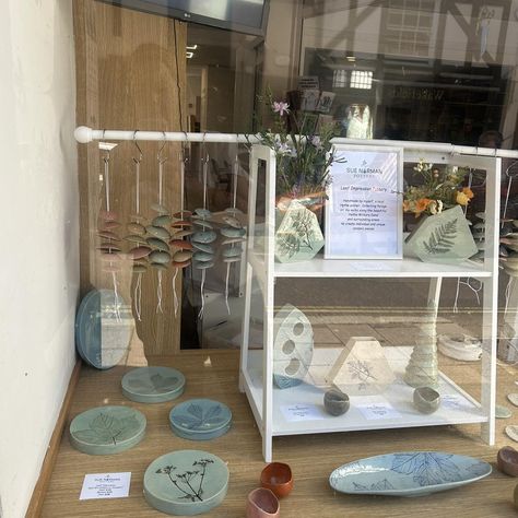 This afternoons been a busy one I’ve taken pottery to Folkestone as per previous post and then straight back to Hythe to create my display in the Open Door Project in the high street for the next 2 weeks. So I officially at present have 3 places where you can find my pottery as well as my website 😊. www.suenormanpottery.co.uk #botanicalart #leafimpressions #leafimpressionsinclay #handmadegifts #handmadewithlove #potterylove #windchimes #pottery #hythekent #smallbusinessbigdreams Pottery Shop, Diy Jewlery, Market Displays, Shop Window Displays, Door Opener, Art Market, Window Display, Botanical Art, Wind Chimes