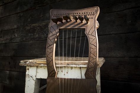 A hand-made one-piece body of a musical instrument made of ash. Ash has an excellent tree structure and an incredibly beautiful texture. * To emphasize the wood pattern, we use tint finishing oils with wax of a premium European brand. * The sound of the instrument will take you back to the ancient ages, will make you feel like a skald composing songs. The instrument is outwardly beautiful and will be an addition to the festival image and will allow you to master new skills. Lyre Harp, Ash Ash, Tree Structure, Festival Image, Stringed Instruments, Wood Pattern, New Skills, String Instruments, Wood Patterns