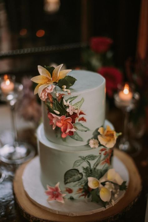 Blue wedding cake with bright beautiful tropical flowers Wedding Cakes Tropical, Tropical Flower Cake, Wedding Cake Forest, Domino Park, Wythe Hotel Wedding, Tropical Wedding Cake, Blue Wedding Cake, Elopement Party, Paradise Wedding