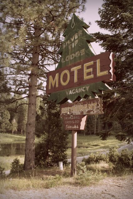 Vintage road sign for an abandoned roadside motel, the Silver Tip Lodge, near Yosemite National Park in northern California. Vintage Road Signs, Northern Gothic, Camp Signage, National Park Signs, Motel Aesthetic, Roadside Motel, Vintage Yosemite, Vintage National Park, Camp Brand