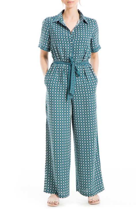 A buttoned jumpsuit crafted from airy crepe features a medallion print for bohemian flair. 59 1/2" length (size S) Spread collar Short sleeves Buttoned placket 100% polyester Machine wash, line dry Imported Model stats: 5'10" height, 32" bust, 25" waist, 36" hip. Model is wearing size S. | Max Studio Medallion Crepe Jumpsuit Collar Jumpsuit, Become A Fashion Designer, Crepe Jumpsuit, Fashion Institute, Innovative Fashion, Versatile Outfits, Button Top, Jumpsuit With Sleeves, Printed Jumpsuit