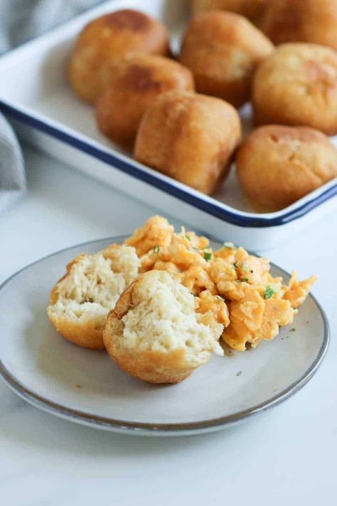 Jamaican fried dumplings are small, round balls of dough that are deep-fried to a golden-brown perfection. Jamaican Fried Dumplings, Coconut Baking, Jamaican Cuisine, Johnny Cake, Fried Dumplings, Deep Frying Pan, Types Of Flour, Baked Fries, Jamaican Recipes