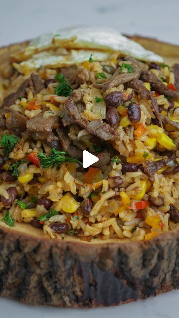 Simbarashe Kamota on Instagram: "My Simple Beef Fried Rice

Ingredients:
- 2 cups cooked white rice
- 1/2 lb beef, thinly sliced
- 1/2 cup sweet corn
- 1/2 cup black beans, drained and rinsed
- 1/2 red pepper, diced
- 1/2 yellow pepper, diced
- 1 onion, diced
- 2 cloves garlic, minced
- 2 tablespoons soy sauce
- 1 tablespoon Worcestershire sauce
- 1 tablespoon Sriracha sauce
- Salt and pepper to taste
- Vegetable oil for cooking

Instructions:
1. In a large skillet or wok, heat some vegetable oil over medium-high heat. Add the beef slices and cook until browned. Remove the beef from the skillet and set aside.
2. In the same skillet, add a little more oil if needed and sauté the onions, garlic, red and yellow peppers until they start to soften.
3. Add the sweet corn and black beans to the s Fried Rice Ingredients, Corn And Black Beans, Cooked White Rice, Beef Fried Rice, Cooking White Rice, Beef And Rice, Rice Ingredients, Yellow Pepper, Sriracha Sauce