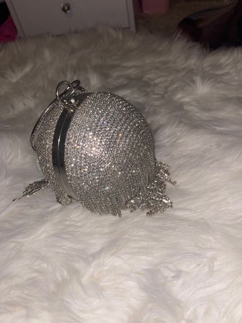 Package Includes: you'll get a round ball crystal evening clutch hand bag that can be applied in different styles, such as evening bag, party purse, and wedding purse to match most outfits Reliable Material: the tassel clutch purse for women is mainly made of PU, rhinestones and fabrics, they are reliable and strong to use, delicate in appearance and easy to open and close Full Size: this ball clutch bag measures approx. 13.38 x 5 x 5 inches and have plenty of room for any essentials you might n 8th Grade Prom, Sneaker Ball, Prom Purse, Ball Ideas, Round Purse, Bridal Purse, Rhinestone Clutch, Crystal Clutch, Wedding Purse