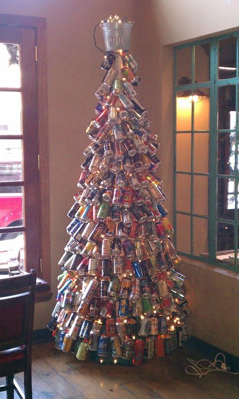 Beer can tree at Percy Street BBQ Beer Can Chandelier, Beer Can Christmas Tree Diy, Beer Can Christmas Ornaments, Beer Tree Christmas, Beer Christmas Decorations, Beer Can Decorations, Beer Can Display Ideas, Beer Cans Crafts Ideas, Beer Can Christmas Tree