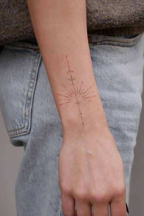 Sun Constellation Tattoo, Fine Line Ornamental Tattoo Hand, Womens Sun Tattoo, Sunshine Tattoo Minimalist, Sun Line Tattoo Design, Fine Line Ornamental Wrist Tattoo, I Am The Sun Tattoo, Sun Related Tattoos, Ornamental Wrist Tattoos For Women