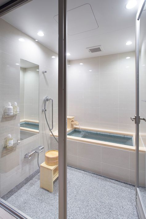 In this bathroom, the designers have taken inspiration from the nearby hot springs, and included a Furo (or Ofuro), a deep Japanese soaking tub. Fun Bathrooms, Japan Bathroom, Washroom Designs, Japanese Bathrooms, Japanese Shower, Japanese Bathroom Design, Japanese Style Bathroom, Japanese Bathroom, California Street