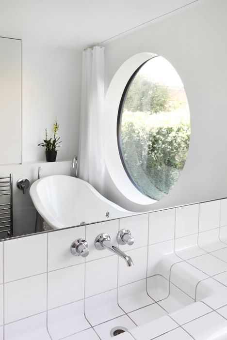 Jimi House by Paul Archer Design features round window inspired by abstract art. Archer Design, Round Window, London House, House Extensions, House Bathroom, Shower Enclosure, White Bathroom, Small Bathroom Remodel, Bathroom Inspiration