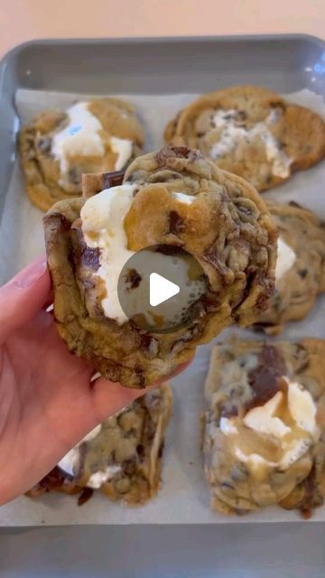 Healthyfoodnews7 on Instagram: "🍪 S’mores Cookies 🍪 

Credit: @bridget.lucille

This was one of my most viewed videos from last year and now that it is officially summer I had to reshare! 

Recipe:
- graham crackers
- chocolate bar
- marshmallows 
- cookie dough 

Place graham cracker, chocolate and marshmallows on a cookie sheet. Lightly press cookie dough on top. Bake at 350 for 10-13 minutes (I recommend checking on cookies after 2-3 minutes because sometimes the marshmallow/cookie dough with fall over and you have to scoop it back on the graham cracker).

#smorescookies #smores #summerrecipes #smorestime #smoresseason #pinterestrecipes #cookiedough #summertreats" Smores Snacks, Cracker Chocolate, Pillsbury Cookie Dough, Baked Smores, Pillsbury Cookies, Hersheys Chocolate, Campfire Desserts, Graham Cracker Cookies, Marshmallow Cookies