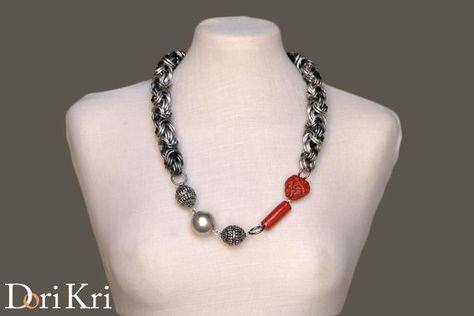 SALE: Chunky asymmetrical dull light and dark silver chain necklace with a red heart detail bead. 15% discount!  Chunky asymmetrical medium length Chunky Jewellery, Chainmail Necklace, Gray Necklace, Red Ceramic, Chunky Chain Necklaces, Ceramic Necklace, Chain Maille, Chunky Jewelry, Chain Mail