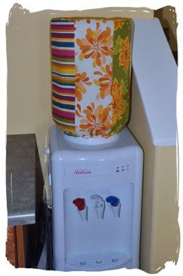 So need to make one of these! Water Cooler Cover Pattern, Water Cooler Cover Diy, 5 Gallon Water Jug Ideas Diy Holder, Water Dispenser Cover Diy, Upcycle 5 Gallon Water Jug, Crochet Jug Covers Free Pattern, Insulated Water Bottle Holder Pattern Sewing, Gallon Water Jug, Gallon Water Bottle