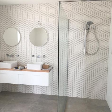 narrow double sink 59 Likes, 8 Comments - Gerard's Tiling (@gerardstiling) on Instagram: “Modern Scandinavian Bathroom ✖️White hexagon sheets and slate grey floor tiles ✖️” Honeycomb Tile Bathroom, Modern Scandinavian Bathroom, White Bathrooms, Honeycomb Tile, Bilik Air, Grey Floor Tiles, Glass Shower Door, Scandinavian Bathroom, Bad Inspiration