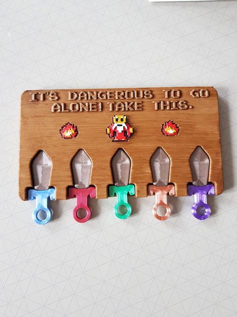 Zelda Key ring Zelda Key holder | Etsy Cute Key Holder, Gaming Gadgets, How To Varnish Wood, Key Holders, Nintendo Game, Key Hooks, Don't Leave, Key Holder, Legend Of Zelda