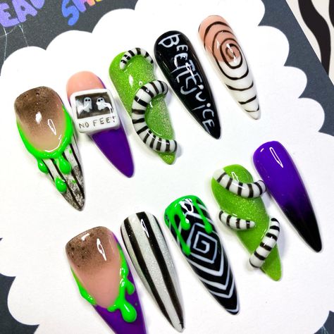 ⭐This 3-D set includes handcrafted nail charms and glow in the dark accents! ✨ This set is made using all gel products. Handmade, Custom, and Made to order. ✨ All nail sets are hand-painted, so any new ideas and customization are available. If you like this design but want them in different colors then please message me. ✨ Included a set :   ★10 press-on nails (you can add extra single nails with this listing https://www.etsy.com/listing/1676243928/custom-press-on-nail-set-andor-custom?click_key Joker Halloween Nails, Beetlejuice Nails Acrylic, Beetlejuice Nail Designs, Beetlejuice Nail Art, Single Nails, Beetle Juice Nails, Beetlejuice Nails, Funky Nail Designs, Horror Nails