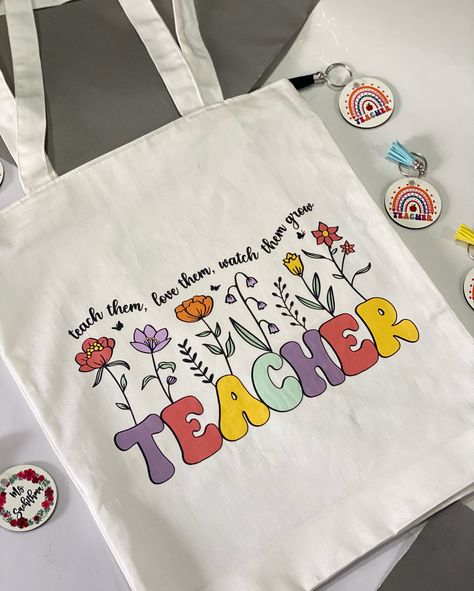 Show your appreciation towards your teacher by gifting them with this lovely tote bag 😍 Message us to place your order Embroidery Teacher, Teacher Tote Bag, Teacher Tote, Everyday Heroes, Teacher Name, Tote Bag, Embroidery, Gifts, Quick Saves