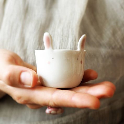 Egg cup with ears! ... Or shot drink glass not to drink alone! . . . #ceramic #eggcup #ceramiccup #animalshape #shortcoffee #handmadeceramics #makersmovement #madeinitaly #breakfast #shotdrink #ceramica #bunny #coniglio #tazzina #colazione#shottino #tramai #etsy #etsyfinds #etsyfavorites #etsyshop #etsyseller #etsygift #ceramicart Good Liquor, Handbuilt Ceramics, Easter Pottery, Ceramic Pinch Pots, Pretty Nose, Bunny Egg, Cup Handmade, Ceramic Bunny, Hand Painted Mugs