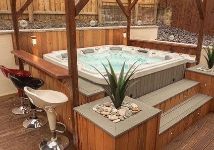 Hot Tub Wrap Around Bar, Diy Hot Tub Area Ideas, Hot Tub And Sauna Ideas Backyard, Under Porch Hot Tub Ideas, Hot Tub And Bar Ideas, Spa Pergola Ideas, Spa Surround Ideas, Hot Tub Steps Ideas, Pergola Over Hot Tub