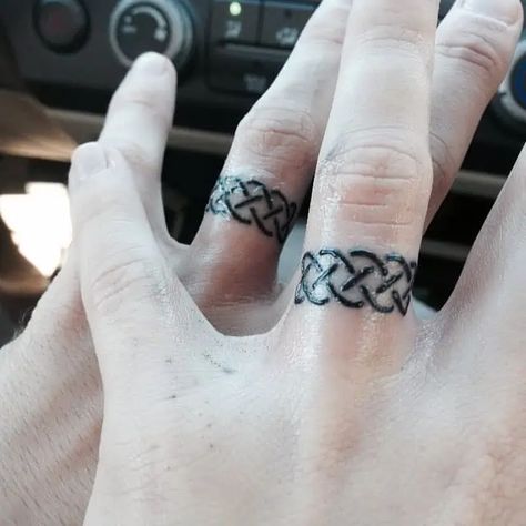 celtic knot wedding ring tattoo Knot Ring Tattoo, Celtic Ring Tattoo, Wedding Ring Tattoo For Men, Wedding Ring Finger Tattoos, Wedding Ring Tattoos, Celtic Knot Wedding Ring, Marriage Tattoos, Ring Tattoo Designs, Wedding Band Tattoo