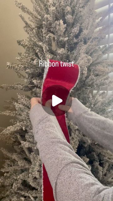 Keri Collins & Suzanne Higgins on Instagram: "A little twist on placing ribbon in your tree. We began with a thick red ribbon trimmed in silver. We did a double loop and secured it with the branches of the tree. Then for fun we used some silver ribbon leftover from a previous tree, rolled it up and placed it into the red ribbon. Don’t be afraid to try something new and unexpected ❤️🩶.
.
.
.
.
.
.#ribbon #ribbontutorial #diyribbon #howto #christmasdiy #christmasdiydecor #themostwonderfultimeoftheyear #lovechristmas #christmas2024 #christmasreels #instachristmas #flocked #redchristmas #christmasinspo #ksforeverdesigns" Ribbon Down A Christmas Tree, How To Loop Ribbon On Christmas Tree, Thick Ribbon On Christmas Tree, Christmas Trees With Red Ribbon, Ribbon In Christmas Tree Ideas, Christmas Tree Silver And Red, Red Ribbon On Christmas Tree, Waterfall Ribbon Christmas Tree, How To Wrap Ribbon Around Christmas Tree