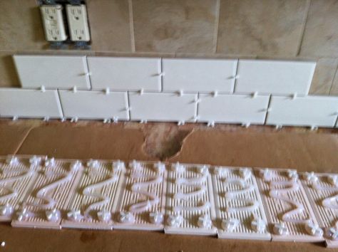 tiling over tile Tile Over Tile, Cleaning Bathroom Tiles, Old Tiles, Brick Backsplash Kitchen, Tile Backsplash Bathroom, Diy Kitchen Backsplash, Kitchen Tiles Design, Brick Backsplash, Kitchen Design Diy