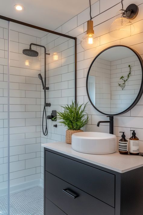 Discover a blend of minimal elegance and functionality with these modern bathroom ideas. Featuring sleek black fixtures, white subway tiles, and chic lighting, this setup brings a fresh, contemporary look to any home. 🌿✨ #BathroomDesign #ModernHome #HomeInspo Bathroom White Gold Black, Black White And Natural Wood Bathroom, White Bathroom With Black Fixtures, Black And White Bathroom Ideas Modern, Small Black And White Bathroom Ideas, Bathroom Black Floor, White Bathroom Ideas Modern, Contemporary Guest Bathroom, White Powder Room