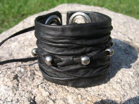 Black Leather  Cuff Bracelet with antique silver color Brass beadsCrushed Black  Italian  Leather.Each Bracelet is hand sculpted into the wrist shape..each is unique and one of a kind.other styles available at https://www.etsy.com/shop/Vacationhouse?section_id=7469185&ref=shopsection_leftnav_6CHOICE OF CORSET BACK OR SNAP BACKVACATIONHOUSE Fine Quality Hats, Beanies, Leather Jewelry, Leather Hair Jewelry, Jewelry, Wraps & Accessories. Luxury Fibers & Italian Leatherswww.Vacationhouse Model Faces, Black Leather Cuff Bracelet, Rock Clothing, Goth Rock, Urban Jewelry, Silverware Jewelry, Leather Cuff Bracelet, Leather Wristbands, Art Jewelry Contemporary