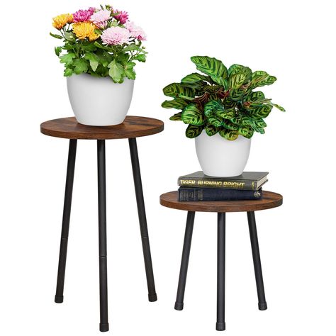 PRICES MAY VARY. 【Unique Design】The legs of the plant stand are made of metal, more stable and solid, the countertop is mid-century rustic wood panel style, suitable for matching with various styles of furniture, and better home decoration options 【DIY Design】This wooden plant stand can be used as one tall and one short two independent flower stand according to your needs or can be assembled together to become a 2-tier plant stand, let's start enjoying the fun of DIY! 【Multi-functional】This plan Outdoor Flower Stand, Plant Holders Indoor, Mid Century Outdoor, Indoor Plant Stand, Small Round Table, Wooden Plant Stands, Outdoor Living Decor, Plant Stand Indoor, Flower Stand