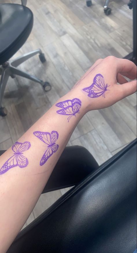 Purple Butterfly Hand Tattoo, Butterfly Tattoo Around Arm, Lilac Butterfly Tattoo, Purple Tattoos For Women, Purple Ink Tattoos, Purple Tattoo Ideas, Men Butterfly Tattoo, Purple Ink Tattoo, Purple Tattoo Ink