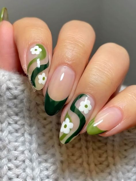 30 St. Patrick’s Day Nail Ideas That Will Bring You A Jolly Holiday - 232 Green Flower Nail Art, Green Plant Nail Design, Dark Green Floral Nails, Green French Tip With Flowers, Dark Green Flower Nails, Dark Green Nails With Flowers, Dark Green Summer Nails, Plant Themed Nails, Cute Green Nail Designs