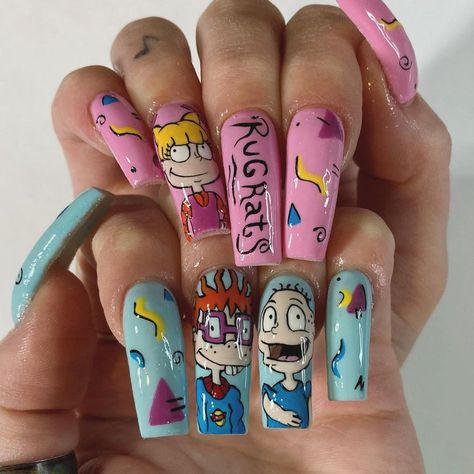 Cory Antunes | Nail Artist on Instagram: “Rugrats 🍼⚡️ hand painted using @nailz_by_dev @nailzbydevshop brushes #handpaintednailart #characternails #cartoonnails #rugrats…” Rugrats Nail Designs, Cartoon Nails Design, Rugrats Nail Art, Rugrats Nails, 90s Cartoon Nails, Cartoon Nails Acrylic, 90s Cartoon Nails Acrylic, Hand Drawn Nail Art, Bright Acrylic Nails