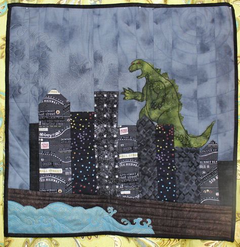 inspired by the new godzilla movie, i made a wall quilt. Godzilla Gifts, Unique Quilt Patterns, Tshirt Quilt Diy, Star Wars Quilt, Godzilla Movie, Unique Quilt Pattern, Garden Boxes Diy, Baby Crib Quilt, Diy Christmas Lights