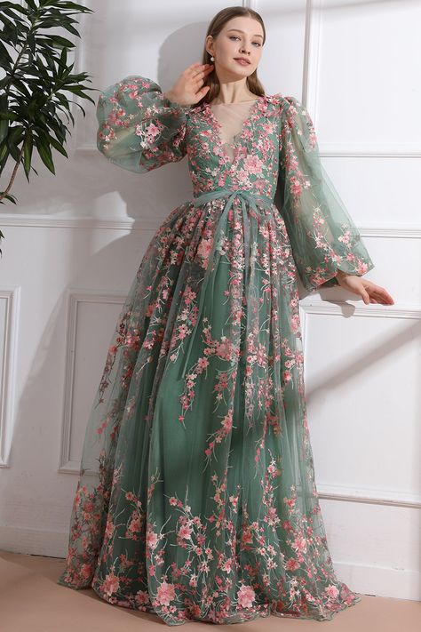 Indulge in the elegance of our Long Sleeves O Neck Pink Floral Embroidery Sage Tulle Dress. Adorned with intricate floral embroidery and crafted from delicate tulle, this dress exudes sophistication and charm. The long sleeves provide coverage while the O neck adds a touch of femininity. Perfect for special occasions and making a statement. Bust and Skirt with full lining. 100% Polyester 100% Recycled polyester lining Concealed zip at center back Imported Sage Green And Pink Outfit, Long Sleeve Floral Embroidered Tulle Dress, Long Sleeve Tulle Dress With Floral Embroidery, Floor-length Tulle Gown With Floral Embroidery, Elegant Lace Embroidered Dress With Floral Applique, Elegant Tulle Gown With Floral Embroidery, Long Sleeve Floral Embroidered Wedding Evening Dress, Lace Embroidered Floral Dress For Wedding, Long Sleeve Floral Embroidery Evening Dress For Wedding