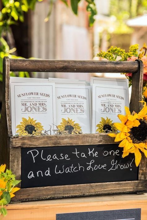 Let your love grow! These seed packets make an excellent wedding favor. Check out more rustic wedding DIYs on our blog! Sunflower Seed Wedding Favors, Sunflower Wedding Favors, Rustic Sunflower Wedding, Country Bridal Shower, Seed Wedding Favors, Sunflower Themed Wedding, Sunflower Bridal Shower, Bridal Sunflowers, Bouquet Bride