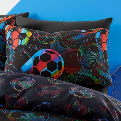 * Reversible football design * Includes matching standard pillowcase(s) * Machine washable * Secure closure * Coordinating eyelet curtain available to purchase separately A must-have for any young sports enthusiast's bedroom. This vibrant bedding ensemble not only showcases an exciting football themed design but also offers versatility with its reversible feature, allowing you to switch up the look whenever you please. Crafted for convenience, the set includes matching standard pillowcase(s) for Football Bedroom Ideas For Boys, Vibrant Bedding, Football Rooms, Football Bedroom, Bedroom Transformation, Football Bedding, Child Room, Football Design, Duvet Sets