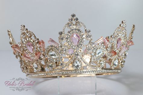 "FAST SHIPPING  Beautiful sparkling crystal tiara plated gold. Perfect for your Quinceañera, Wedding, First Communion or Confirmation. It has a loop at the end of each side to attach it in your hair with bobby pins for added security. Approx. 3.25\" tall at its tallest point Approx. 18\" Around Diameter: 6\" Style DA-RNP150G We usually ship within 1-2 business days." Sweet Sixteen Crown, Pink Sweet 16 Crown, Pink 15 Crown, Rose Gold Quince Crown, Pink Crowns For Quinceanera, Quinceanera Pink Crown, Quince Crowns Gold, Pink And Gold Quince Crown, Quinceanera Crowns Gold