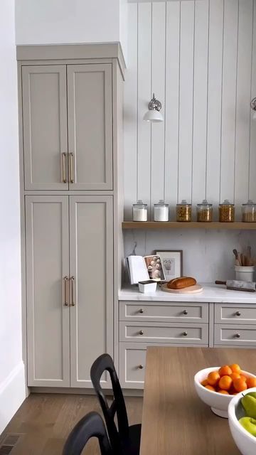 Ellen Fleckenstein on Instagram: "How about that cabinet color? The Modern Tudor pantry by @cambridgehomecompany is a great example of timeless transitional design. Follow @ellenfleckinteriors for more interior inspiration and design ideas #ellenfleckinteriors #kitchendesign #kitchenisland #kitchens_of_instagram #kitchenremodel" Colors For Laundry Room, Modern Tudor, Laundry Room Colors, Condo Interior Design, Condo Interior, Cabinet Color, Cabinet Colors, Transitional Design, Home Decor Kitchen