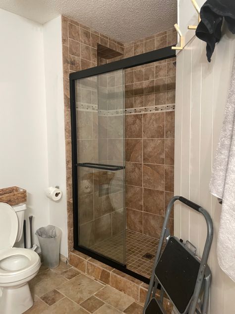 Door To Backyard From Bedroom, Painting Shower Tiles Diy, Can You Paint Shower Tile Walls, How To Paint Bathroom Shower Tile, Brown Tile Bathroom Makeover, Bathroom Remodel With Brown Tile, Paint Tile Shower Wall, How To Paint Shower Tiles In Bathroom, Painting Tile Shower Wall Before And After