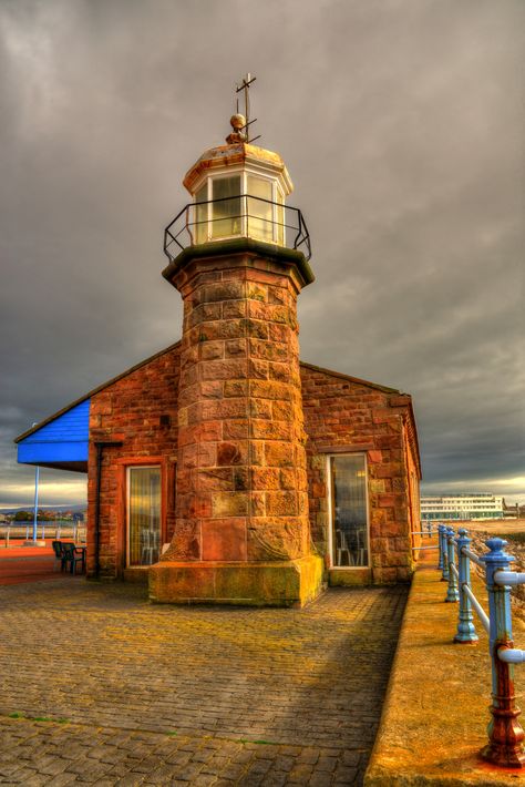 The Stone Pier Lighthouse at Morecambe, Lancashire, England was built in 1855. The octagonal stone tower with lantern and gallery is 26 feet tall. The lighthouse formerly guided railroad ferries sailing between Morecambe, England and Ireland. It is operated by the Lancaster Port Commission. Lighthouse Inspiration, Lancashire England, Sea Storm, Stone Tower, Lighthouse Photos, Lighthouse Pictures, All That Remains, Beautiful Lighthouse, Architecture Drawing Art