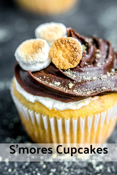 This easy S'mores Cupcake recipe is made with a cake mix from a box and baked in the oven. It is a marshmallow filled graham cracker cupcake (made with graham crackers!) topped with chocolate frosting. It is the BEST homemade s'mores cupcake you'll ever make! AD #cupcake #smores #dessert #summerdessert #kids #chocolate #marshmallow #homemadeinterest via @hmiblog Frosting For Chocolate Cupcakes, Easy Smores, Chocolate Ganache Recipe, Smores Cupcakes, Easy Cupcake Recipes, Cupcakes Recipes, Vanilla Cupcake Recipe, Ganache Recipe, Easy Cupcakes