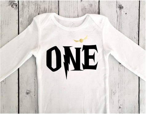 1st birthday boy the chosen one Harry Potter themed onesie.  Long or short sleeves. Chosen One, Golden Snitch, First Birthday Shirts, Baby Boy 1st Birthday, Harry Potter Birthday, 1st Birthdays, Boy First Birthday, The Chosen, 1st Boy Birthday