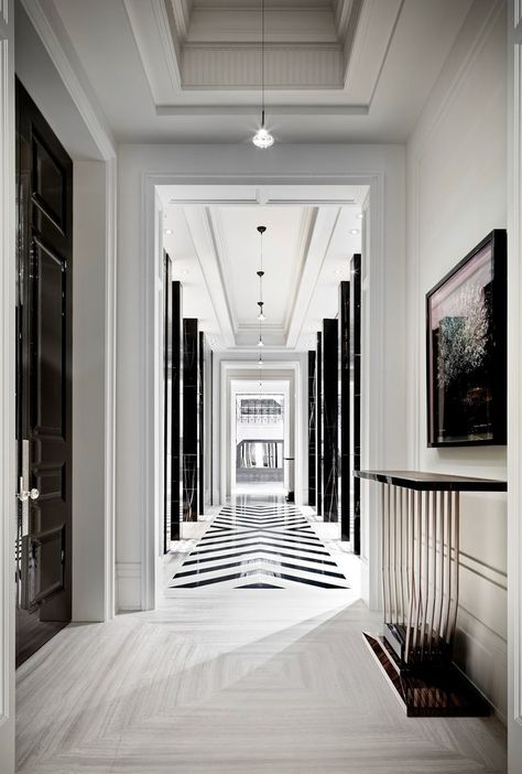 This black-and-white hallway isn't the only mesmerizing thing about this $50 million Ferris Rafauli–designed home in Toronto, an unabashed ode to luxury | archdigest.com Black And White Hallway, Ferris Rafauli, Interior Art Deco, Decoration Hall, White Hallway, Corridor Design, Interior Design Minimalist, Black And White Interior, Gorgeous Interiors