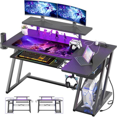 PRICES MAY VARY. L-SHAPED GAMING DESK WITH MONITOR STAND - Armocity L gaming desk features an elevated desk monitor ledge, which will help to release your neck stress and give you more room to place your monitor setups. The longer side tabletop space will help to place your laptop, gaming peripherals, and other essential equipment. The other is your arm can rest on the L part. It's really all good. GAMER DESK WITH OUTLETS & SMART LED - The charging tower next to the monitor stand makes your setu Gaming Desk With Shelves, Elevated Desk, L Shaped Gaming Desk, Desk With Led Lights, Desk With Monitor Stand, L Shaped Computer Desk, Pc Gaming Desk, Desk With Monitor, Desk With Shelves