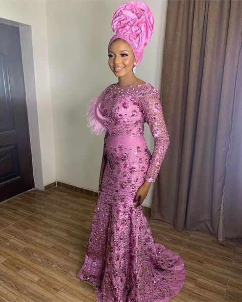 92 Likes, 0 Comments - African Sweetheart Weddings (@africansweetheartweddings) on Instagram: “Pretty in pink 💗 Congratulations @absee_20 MUA/Turban: @tafeedas_glamour Head wrap:…” Net Lace Aso Ebi Styles, Cord Lace Gown Styles, Lace Gown Styles Nigerian, Prom Dresses Long Sleeves, Mermaid Prom Dresses Long, Aso Ebi Style, African Couture, Aso Ebi Lace Styles, Reception Gowns