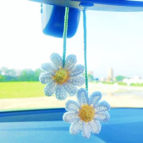 PRICES MAY VARY. ✿ LIFELIKE FlLOWER DESIGN: These car mirror hanging accessories are handmade with high quality cotton yarn, unique design and bright color, add a touch of charm to your car decoration. You can spray your favorite perfume on the plants and the scent will slowly emanate as you drive. ⚘ MULTI-PURPOSE: This rear view mirror pendant is not only a car decor, but also can be used as a bag charm, keychain accessory, curtain bundle, room decoration and so on. ✿ SAFE DRIVING: Adjust the h Crochet Car Decoration, Crochet Rear View Mirror Accessories, Crochet Car Mirror Hanging Pattern Free, Mirrors Ideas, Car Mirror Decorations, Car Mirror Hanging Accessories, Car Mirror Hanging, Crochet Keychains, Hanging Crochet