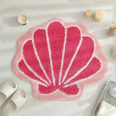 Beachcrest Home™ Bretz Bath Rug Polyester in Pink | 22" W X 26" L | Wayfair Bathroom Decor Preppy, Cute Bathroom Rugs, Coastal Cowgirl Bathroom, Preppy Rugs, Seashell Rug, Tufted Rug Ideas, Preppy Bathroom Decor, Rug Tufting Ideas, Cute Seashell