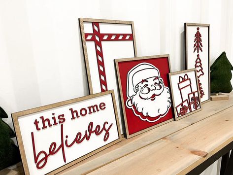 Brighten up your mantle with cute Christmas signs, framed art sets, and candy cane stripes. Discover delightful decorations that bring joy to your home during this magical time of year! Cute Christmas Signs, Santa Mantle, Laser Signs, Laser Cut Decor, Christmas Wooden Signs, Laser Cut Wood Crafts, Trees Christmas, Contemporary Christmas, Candy Cane Stripes