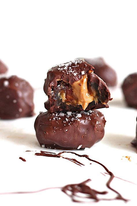 Dark Chocolate Covered Peanut Butter Stuffed Dates with Sea Salt - The BakerMama Peanut Butter Stuffed Dates, Chocolate Covered Desserts, Stuffed Dates, Chocolate Covered Peanuts, Salty Treats, Peanut Butter Sandwich, Chocolate Chip Ice Cream, Peanut Butter Recipes, Homemade Candies