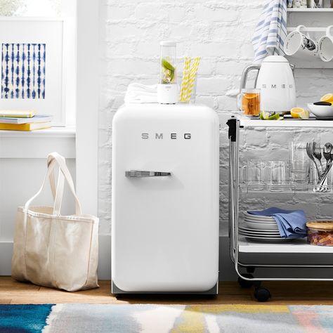 Smeg Mini Refrigerator | Williams Sonoma Smeg Mini Fridge, Balcony Shelf, College Kitchen Essentials, Smeg Refrigerator, Most Comfortable Couch, Cool Mini Fridge, Smeg Fridge, Fab 5, Mini Refrigerator