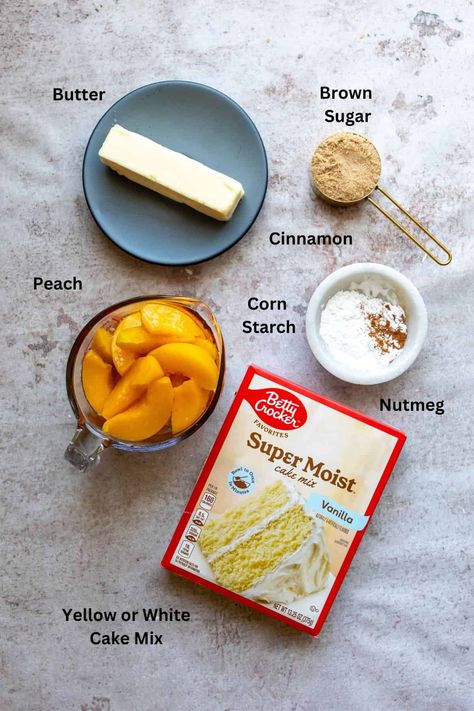 Canned Peach Cobbler Recipe Cake Mixes, Peaches And Cream Poke Cake, Cake Box Peach Cobbler, Yellow Cake Mix Peach Cobbler Recipe, Peach Cobbler With Cake Mix Yellow, Peach Upside Down Cake With Box Cake, Peach Poke Cake, Peach Cobbler With Frozen Peaches, Cake Peach Cobbler